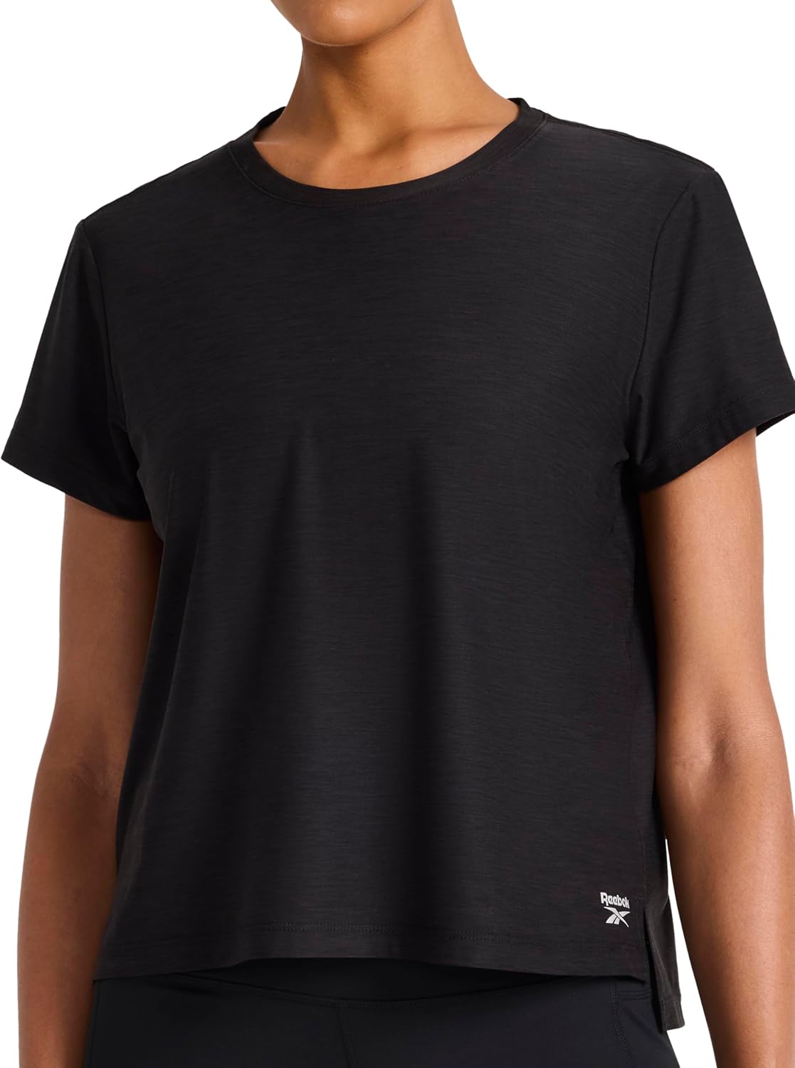 Read more about the article Reebok Women’s Tech Short Sleeve Crewneck T-Shirt, Standard Fit, Lightweight Stretch Heathered Poly Fabric